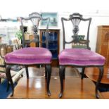 A pair of ebony style dining chairs with cabriole