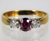 An 18ct gold ring set with 0.3ct diamond & 0.45ct