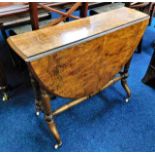 A Victorian burr walnut Sutherland table with cera