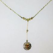 An Edwardian necklace set with white & fancy yello