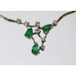 A 14ct gold emerald & diamond necklace 10.8g