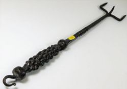 An 18thC. iron meat skewer with knotted handle 25i