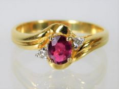 A 14ct gold ring set with ruby & diamond 2.8g size