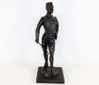 A bronze soldier figure with sword 15in tall
