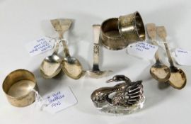 An assortment of silver items including a silver b