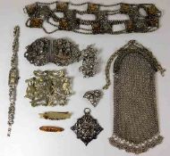 A white metal mesh purse, a small 9ct gold baby brooch, two nursing buckles & other items