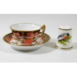 A miniature Royal Crown Derby cup & saucer with im