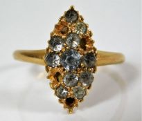 An antique 18ct gold ring set with paste stones, s