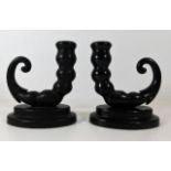 A pair of early 20thC. candle holders, possibly ba