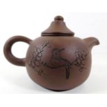 A Chinese porcelain Yixing teapot 5.75in wide