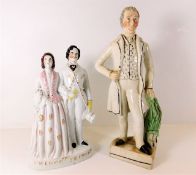 A Staffordshire Prince & Princess figure twinned w