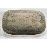 A monogrammed white metal box with chased decor 55