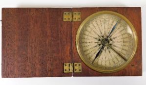 An antique compass box 3.5in x 3.5in
