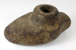 A carved neolithic stone axe head