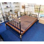 A Victorian double brass & iron bed with original
