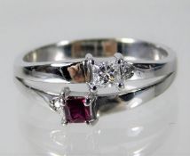 A 14ct white gold ruby & diamond ring 3.5g size O