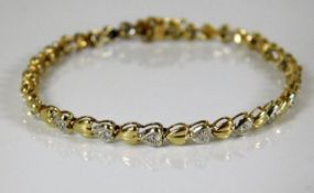 A 10ct gold bracelet set with 0.25ct diamonds 6.9g