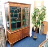 A 19thC. walnut display cabinet with glazed doors 71.5inH x 48.5inW x 18inD