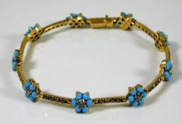 An 18ct gold turquoise & diamond bracelet 14.6g