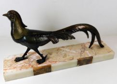 An art deco spelter pheasant mounted on marble bas