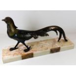 An art deco spelter pheasant mounted on marble bas