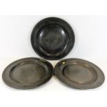 Three large 19thC. pewter chargers, 15in diameter