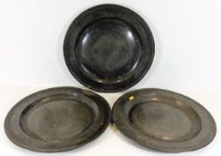 Three large 19thC. pewter chargers, 15in diameter