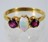 A 9ct gold ruby & opal ring 1.8g size M/N