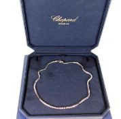 A ladies Chopard necklace made from heavy gauge bo