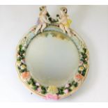 A late 19thC. Meissen style porcelain mirror by Si