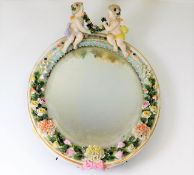 A late 19thC. Meissen style porcelain mirror by Si