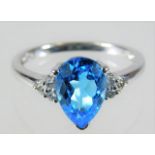 A 9ct white gold ring set with London Blue topaz &