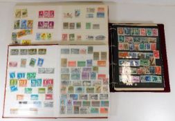 Three stamp albums of mixed international stamp