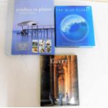 Assortment of coffee table books including The Blu