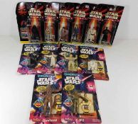 A quantity of carded Star Wars figurines including