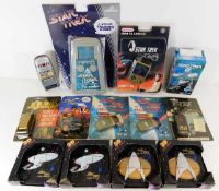 A quantity of Star Trek key fobs and games