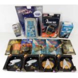 A quantity of Star Trek key fobs and games