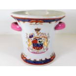A Chinese porcelain wine cooler with unusual coat