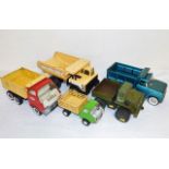 Three Tonka trucks, a Meccano Truck and one other