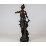 Bronze figurine of a woman approx 10.75" tall
