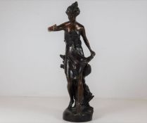 Bronze figurine of a woman approx 10.75" tall