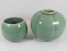 Two Royal Copenhagen green glazed vases tallest is