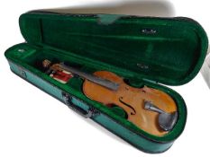 An antique Pierre Nicolo antique violin, some faults in later case