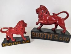 Two ceramic Booth's Gin Lions the tallest is appro