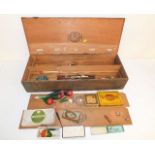 A box of vintage fishing tackle