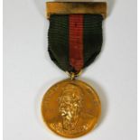 A plated Aga Khan medal