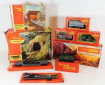 A small quantity of boxed Triang train accessories