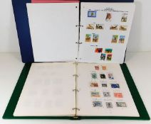 Two stamp albums of Australia and Canada