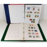 Two stamp albums of Australia and Canada