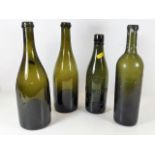 Three antique bottles and one early 20th Century C